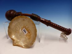 A SAILOR'S WOODEN COSH WITH THE TURNED HANDLE JOINED TO THE BALL HEAD BY A FLEXIBLE LEATHER