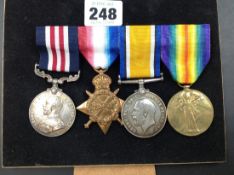 A FIRST WORLD WAR FOUR MEDAL GROUP INCLUDING THE MILITARY MEDAL AWARDED TO PRIVATE G PARKER OF THE