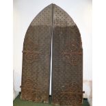 AN IMPRESSIVE PAIR OF 19th.C.GOTHIC TOP CHURCH DOORS WITH IRON STUDWORK AND SCROLLING WROUGHT IRON