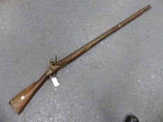 A CONTINENTAL FLINTLOCK MUSKET WITH BRASS MOUNTS (SOME ABSENT) NUMBERED 1224.