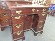 A GEO.III.MAHOGANY SATINWOOD CROSSBANDED AND INLAID KNEEHOLE DESK WITH CENTRAL CUPBOARD AND