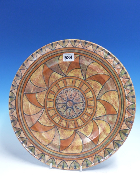 A BURGESS AND LEIGH DISH DESIGNED BY CHARLOTTE RHEAD WITH OCHRE, ORANGE AND GREY GEOMETRIC