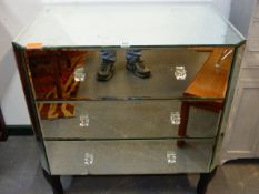 AN ART DECO STYLE MIRRORED CHEST OF THREE DRAWERS. 61 x 51 x H.81cms TOGETHER WITH SIMILAR