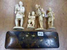 FOUR JAPANESE SECTIONAL IVORY FIGURES OF WORKMEN ILLUSTRATED THEIR TRADES, THE TALLEST. H 21cms.