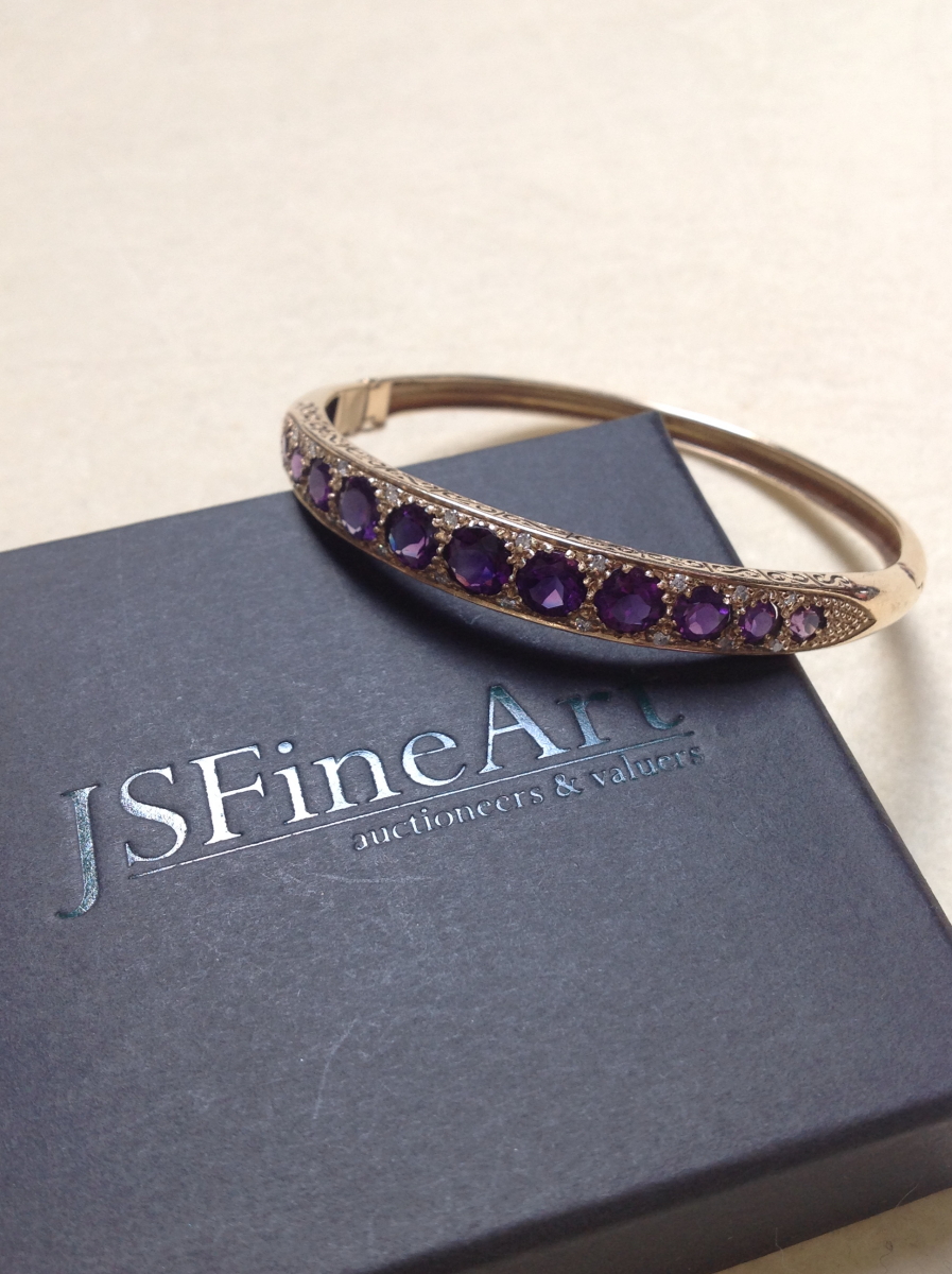 A 9ct GOLD AMETHYST AND DIAMOND CARVED HINGED BANGLE COMPLETE WITH FIGURE OF EIGHT SAFETY CLASP, - Image 9 of 14