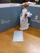 A BOXED AND CERTIFICATED LLADRO FIGURE OF UTOPIA, THE LADY IN A WIND BLOWN LONG DRESS HOLDING A VASE