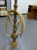 A LARGE EASTERN BRASS HOOKAH PIPE. H.119cms.