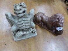 TWO SCULPTURE MOULDS, A RECLINING LION WITH PAW RAISED ON A BALL. W 33cms. TOGETHER WITH A WINGED