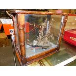 AN INTRIGUING GLAZED PINE CASED MODELOF A BRITISH TWO MASTED SHIP, THE RED AND BLACK HULL FORMED