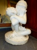 A SCULPTED MARBLE STATUE OF A CLASSICAL SEATED NUDE. H.56cms.