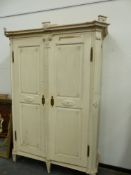 AN IMPRESSIVE CARVED AND PAINTED 19th.C.NORTH EUROPEAN ARMOIRE. W.180 x D.60 x H.250cms.