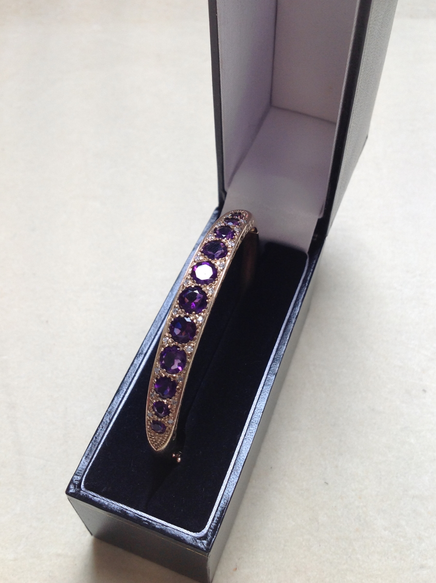 A 9ct GOLD AMETHYST AND DIAMOND CARVED HINGED BANGLE COMPLETE WITH FIGURE OF EIGHT SAFETY CLASP, - Image 2 of 14