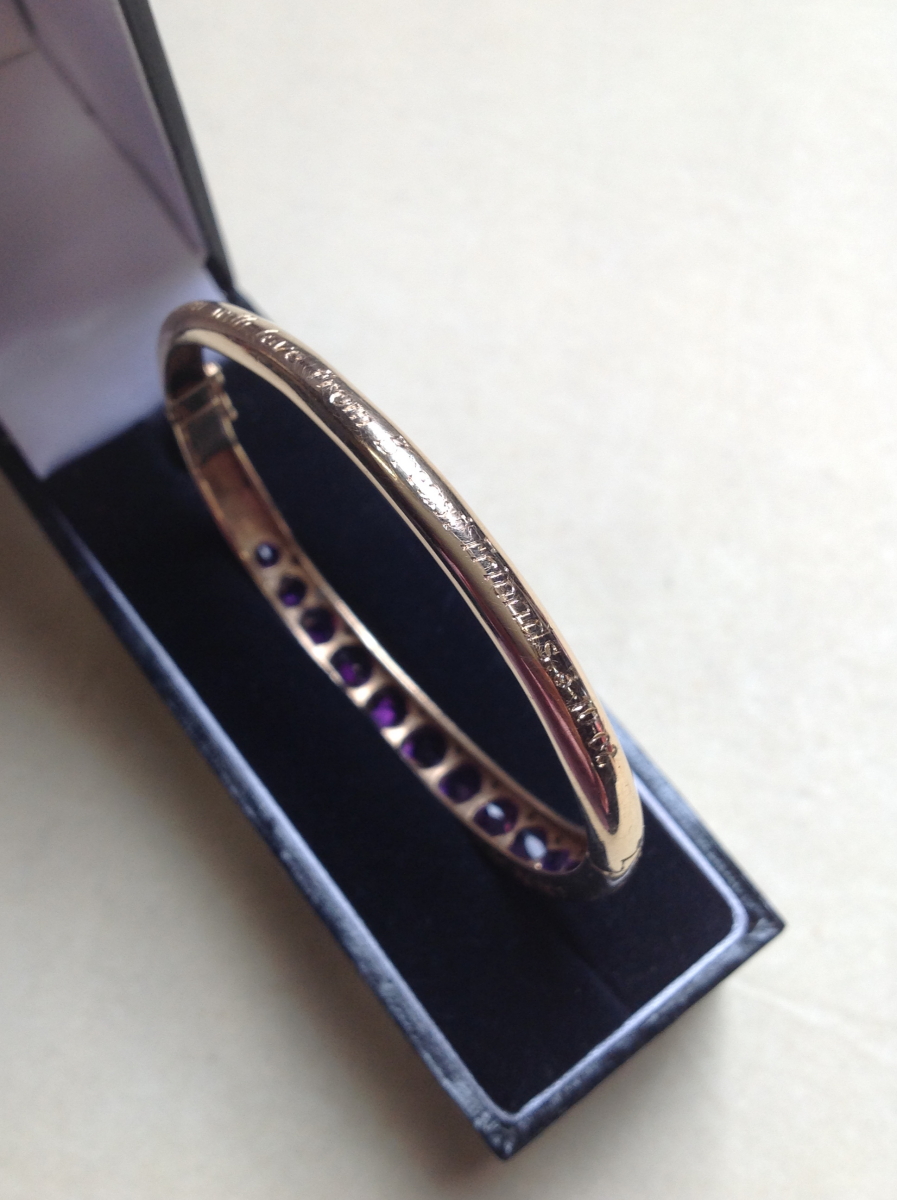 A 9ct GOLD AMETHYST AND DIAMOND CARVED HINGED BANGLE COMPLETE WITH FIGURE OF EIGHT SAFETY CLASP, - Image 6 of 14