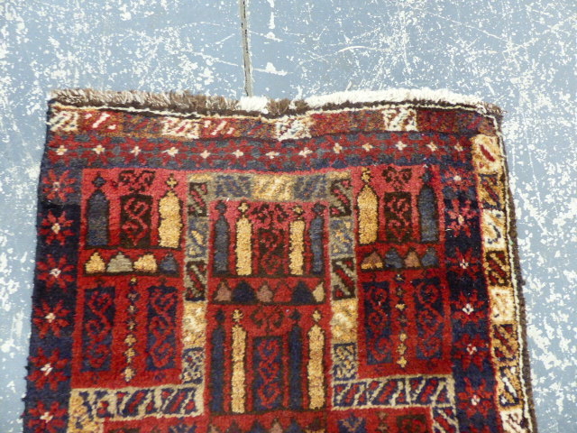 AN AFGHAN TRIBAL PRAYER RUG. 150 x 72cms TOGETHER WITH AN UNUSUAL BAG FACE. 115 x 98cms. (2) - Image 7 of 10