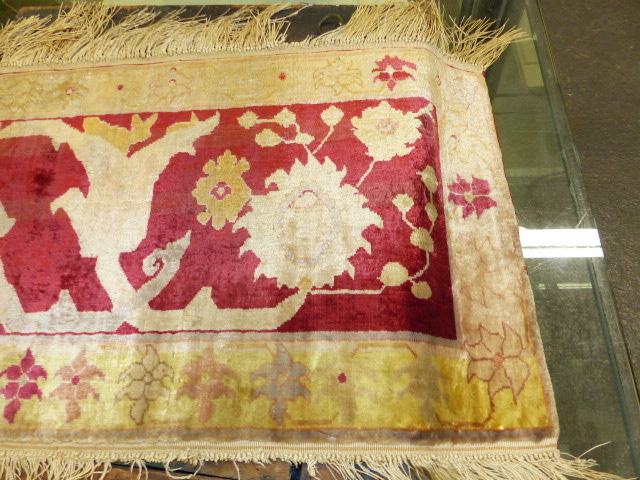 AN ANTIQUE PERSIAN KNOTTED SILK PANEL. 33 x 116cms. - Image 5 of 8