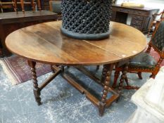 AN 18th.C.OAK COTTAGE GATELEG TABLE ON BOBBIN SUPPORTS. 90 x 145 x H.73cms.