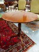 AN EARLY 19th.C.MAHOGAY TILT TOP TRIPOD TABLE. Dia.59 x H.72cms.