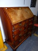 AN IMPRESSIVE 18th.C.WALNUT AND CHEQUER INLAID BUREAU WITH FITTED INTERIOR OVER TWO SHORT AND