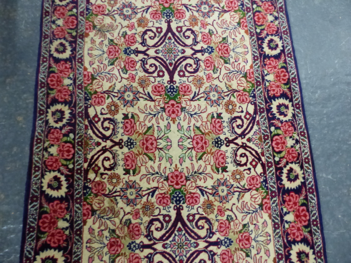 A PERSIAN FLORAL PATTERN SMALL RUNNER. 191 x 75cms. - Image 4 of 6