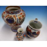 AN 18th C. CHINESE IMARI BALUSTER MUG, A JAPANESE IMARI BALUSTER JAR. H 20.5cms TOGETHER WITH A