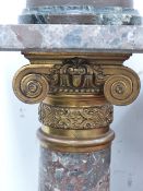 A PAIR OF FRENCH MARBLE ORMOLU MOUNTED GALLERY PEDESTALS. IONIC FORM CAPITALS SUPPORTED BY COLUMNS