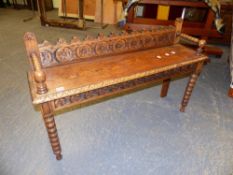 AN ANTIQUE OAK HALL BENCH OR WINDOW SEAT ON BOBBIN TURNED FORELEGS. 106 x 28 x H.66cms.