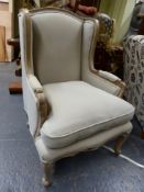 A LOUIS XV.STYLE BLEACHED WALNUT SHOW FRAME ARMCHAIR WITH LOOSE SQUAB CUSHION.