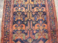 AN ANTIQUE PERSIAN HAMMADAN RUG. 188 x 105cms TOGETHER WITH ANOTHER OF LATER DATE. 213 x 136cms. (