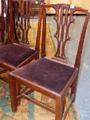 A SET OF SIX CARVED MAHOGANY LATE GEORGIAN CHIPPENDALE DESIGN DINING CHAIRS WITH GOTHIC REVIVAL BACK