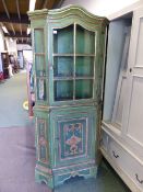 A 19th C. FRENCH GREEN PAINTED PINE CORNER CUPBOARD, THE UPPER HALF GLAZED BELOW THE SERPENTINE CORN