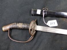 A PRUSSIAN GUARD'S SWORD WITH W R II MONOGRAM ON THE WIRE BOUND HANDLE IN BLACK SCABBARD TOGETHER