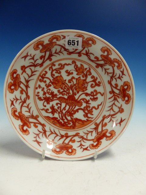 A CHINESE DISH PAINTED IN IRON RED WITH CENTRAL LOTUS ROUNDEL ENCLOSED BY RUYI VINE BAND, FOUR
