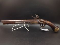 A FLINTLOCK BELT PISTOL WITH BRASS MOUNTED RAMROD AND IRON SLIDE OVER BELT BAR, LOCK MARKED TOWER