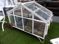 A RARE VINTAGE WHEELED GARDEN CLOCHE OR MINIATURE GREENHOUSE WITH RISING VENT TOP AND FOLDING BARROW
