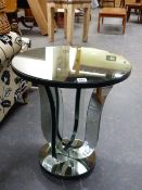 AN ART DECO STYLE MIRRORED OCCASIONAL TABLE ON SHAPED SUPPORTS. Dia.50 x H.56cms.