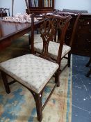 FOUR ANTIQUE CARVED MAHOGANY GEORGIAN STYLE CHAIRS.