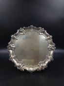 A HALLMARKED SILVER SALVER DATED 1923 SHEFFIELD, FOR WILLIAM HUTTON & SONS LTD, DIAMETER 26.5cms,