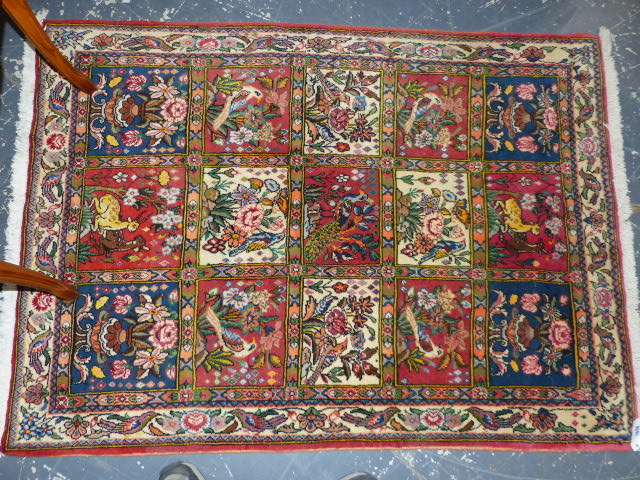 A PERSIAN RUG OF GARDEN DESIGN. 142 x 103cms AND ANOTHER OF BIDJAR DESIGN (2)