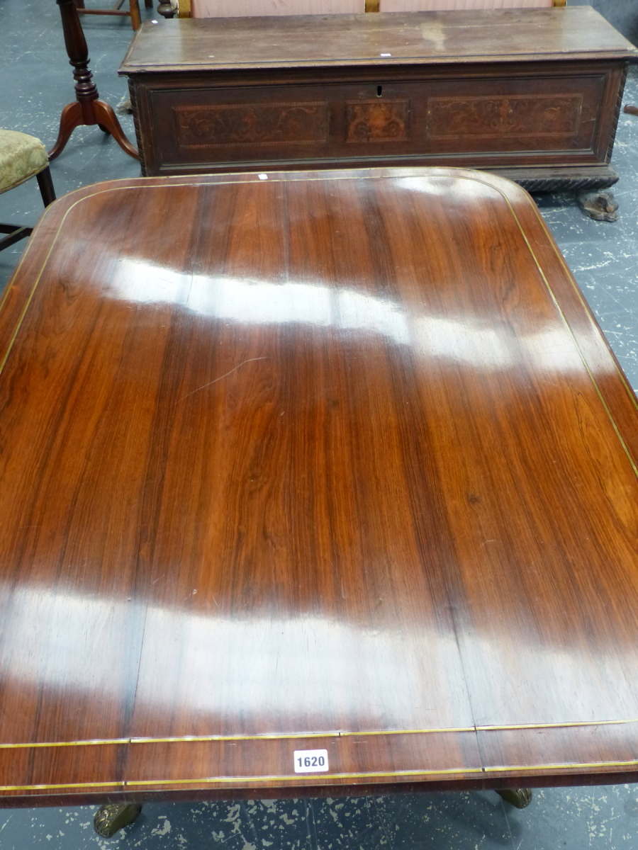 A REGENCY ROSEWOOD AND BRASS INLAID TILT TOP BREAKFAST TABLE ON QUADRUPED SABRE LEGS. 98 x 140 x H. - Image 4 of 14