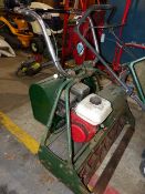 A GOOD QUALITY JOHN WILDER CYLINDER MOWER.