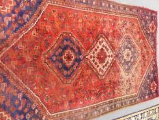 A PERSIAN SHIRAZ RUG. 276 x 175cms.