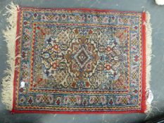 AN ANTIQUE PERSIAN TABRIZ PRAYER RUG. 120 x 84cms TOGETHER WITH A LATER MAT. (2)