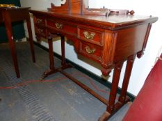 A VICTORIAN PITCH PINE DRESSING TABLE ON END SUPPORTS WITH CARVED FEET. 95 x 50 x H??