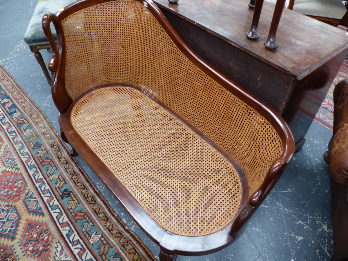 A GOOD QUALITY FRENCH STYLE HARDWOOD AND CANED SMALL CHAISE LONGUE WITH SWAN FORM ARMS AND FEATHER - Image 6 of 11