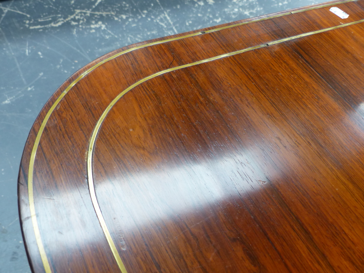 A REGENCY ROSEWOOD AND BRASS INLAID TILT TOP BREAKFAST TABLE ON QUADRUPED SABRE LEGS. 98 x 140 x H. - Image 9 of 14