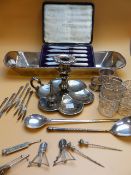 A WHITE METAL CHAMBER STICK, A SET OF SIX EPNS APOSTLE FORKS, AN EASTERN SPOON, A RUSSIAN ENGRAVED