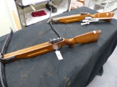 TWO BARNET WILDCAT CROSSBOWS, ONE WITH COCKING LEVER.