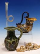 A PRATT PIPE WITH COILED STEM. W 21cms. A GLASS HORN WITH VASELINE MOUTHPIECE. W 35.5cms. A
