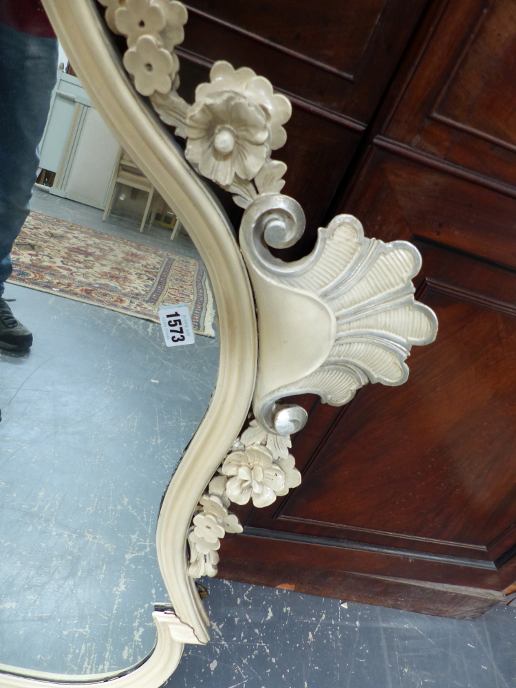 AN ANTIQUE SHAPED FRAME WALL MIRROR WITH CARVED CREST. 96 x 82cms. - Image 2 of 7