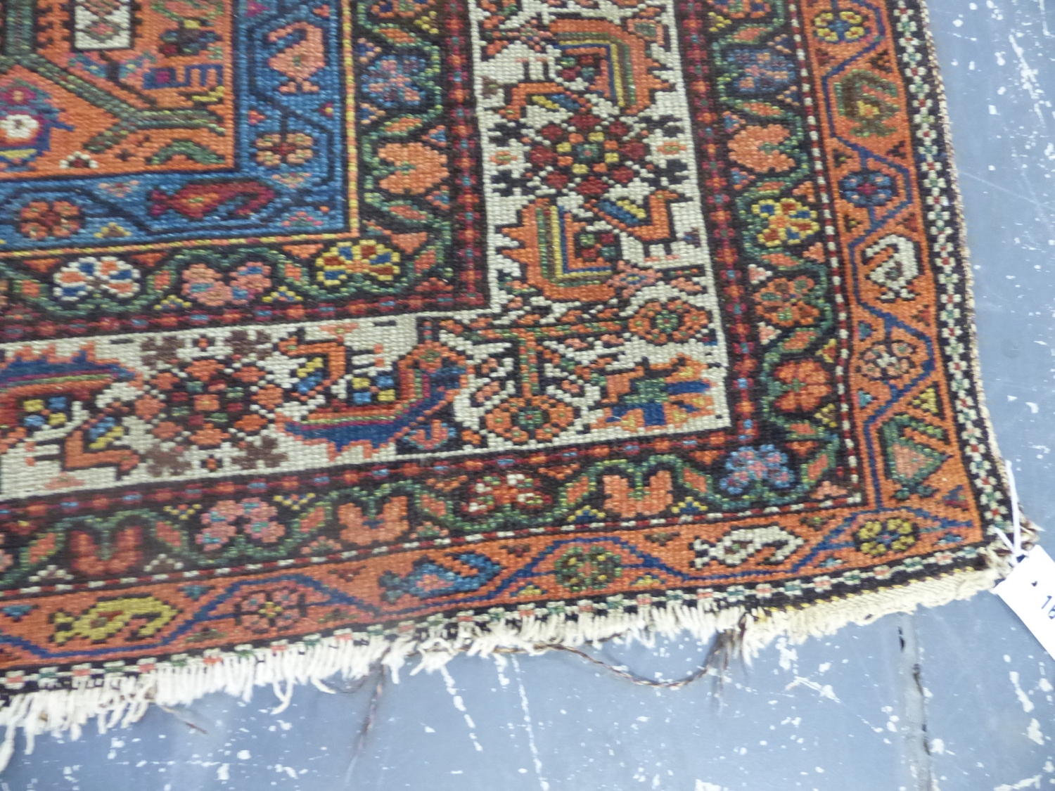 AN ANTIQUE PERSIAN TRIBAL RUG. 200 x 126cms. - Image 4 of 9